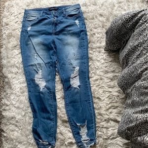 Stretchy, Distressed Jeans make your booty POP!